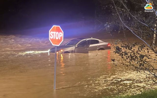 A car submerged in floodwater in Omaha due to record flooding