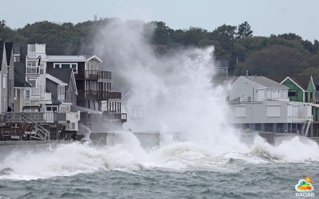 Waves slam into coastal homes as a nor’easter batters the region